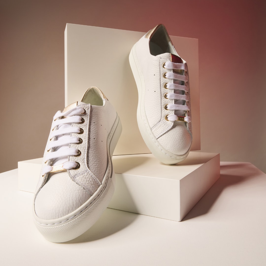 Star - Grain White Leather & Champagne Wide Fit Trainers by Calla Shoes.